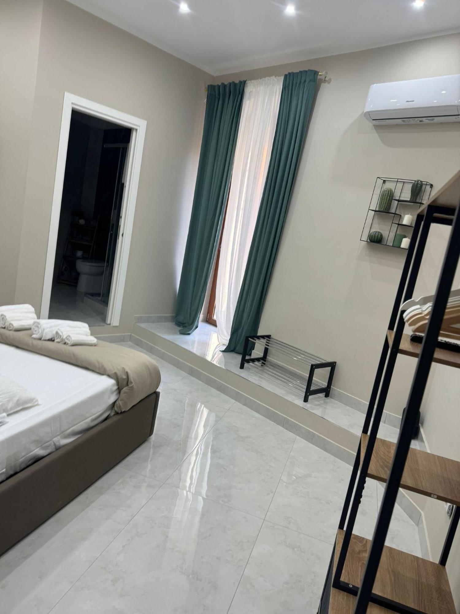 Chambre Quadruple avec Salle de Bains Privative